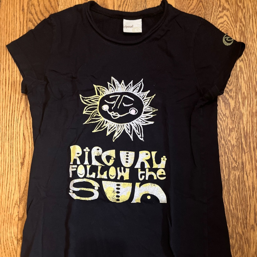 3/$20 Rip curl black T-shirt with print. Size small.